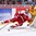 MONTREAL, CANADA - DECEMBER 26: Denmark's William Boysen #18 gets tripped up by Sweden's Lucas Carlsson #23 during preliminary round action at the 2017 IIHF World Junior Championship. (Photo by Andre Ringuette/HHOF-IIHF Images)

